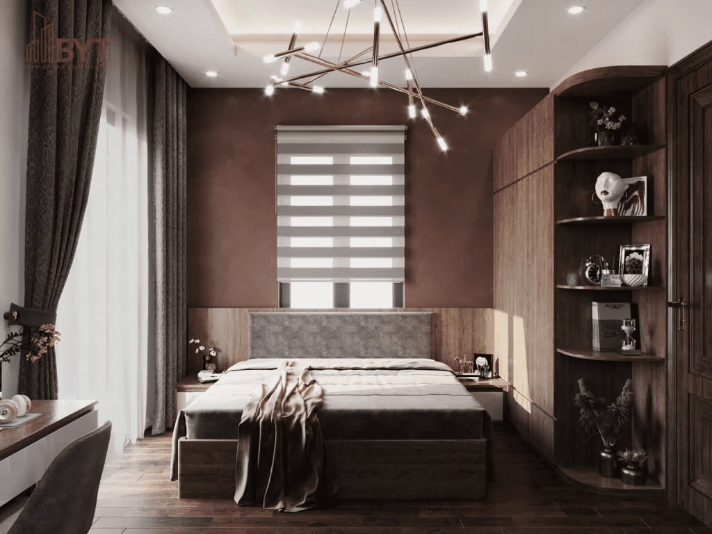 Mẫu thiết kế phòng ngủ căn hộ sử dụng gam màu trầm kết hợp đèn thả trần hiện đại và hệ tủ bo cong tinh tế, tạo điểm nhấn nghệ thuật độc đáo