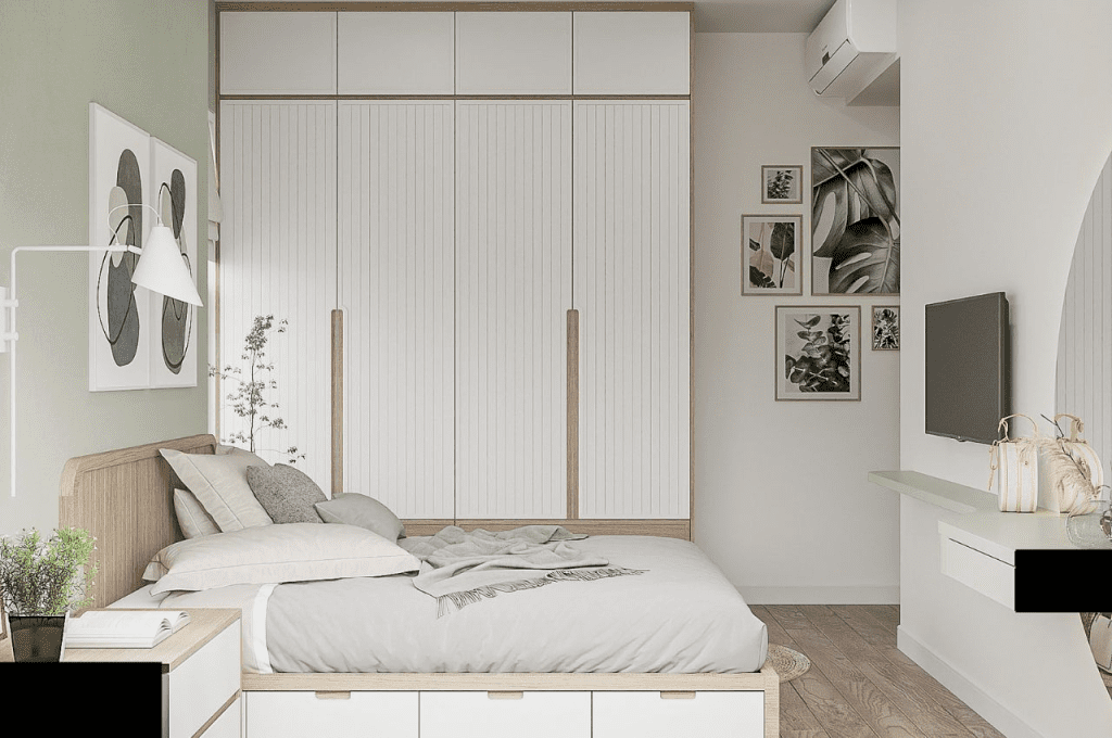 Phòng ngủ căn hộ 50m2 bố trí tủ âm tường tối ưu không gian, kết hợp màu sáng và nội thất tối giản tạo cảm giác rộng rãi