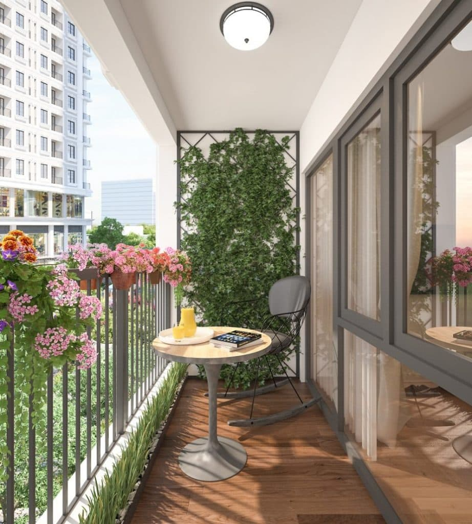 Thiết kế mẫu ban công cho căn hộ chung cư thư giãn với cây xanh và bàn đọc sách