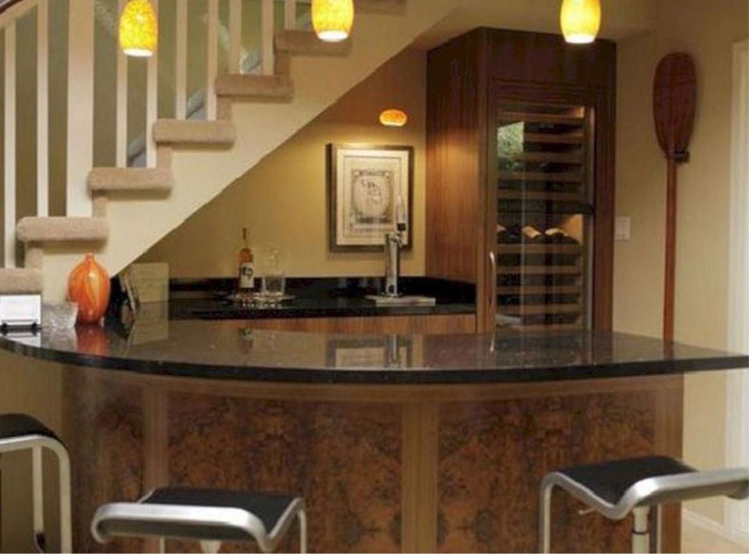 10 cách trang trí gầm cầu thang phòng khách tối ưu diện tích